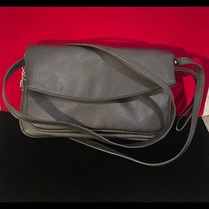 Black leather clutch